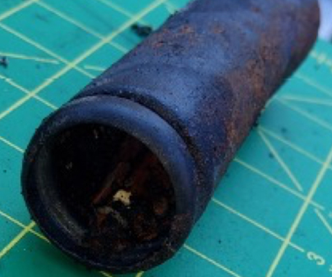 Battery with missing cap